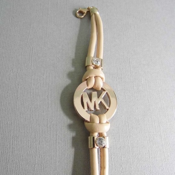 Fashion Goldtone Logo Bracelet - Picture 1 of 4